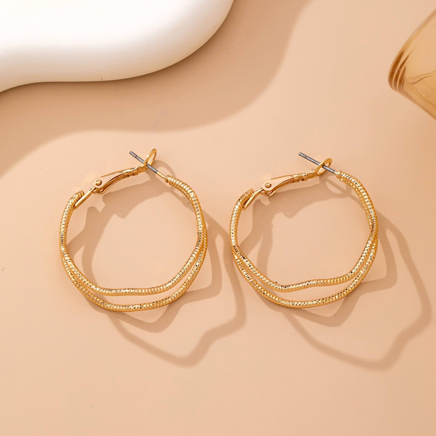JOSSLYN by wall to wall - Textured Wavy Gold Hoop Earrings | 80E61896
