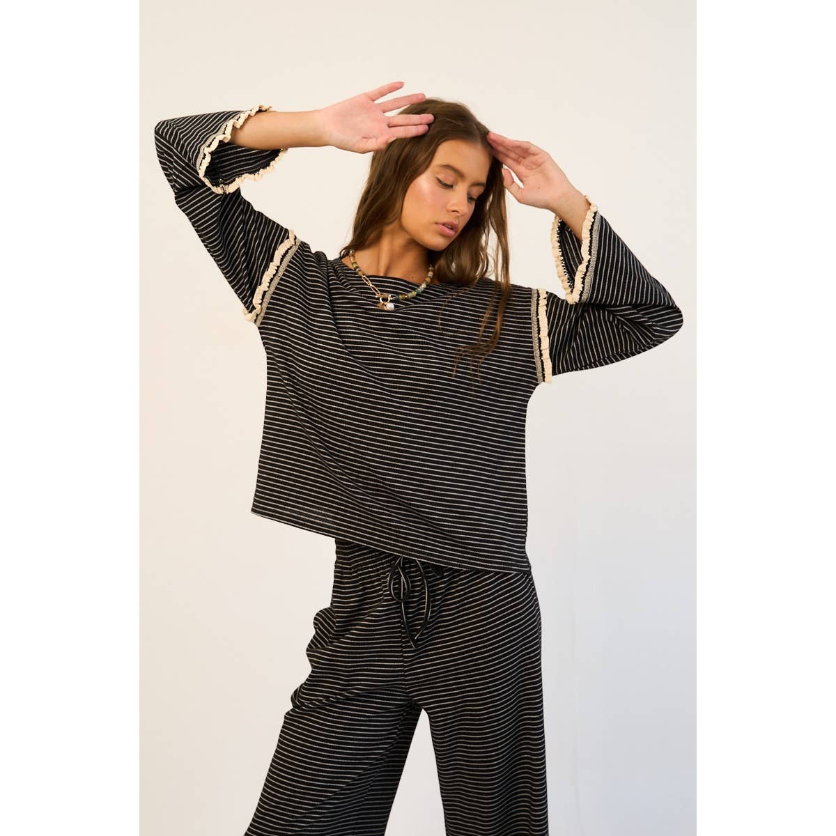 The GREii - Striped Ruffle Knit Long Sleeve
