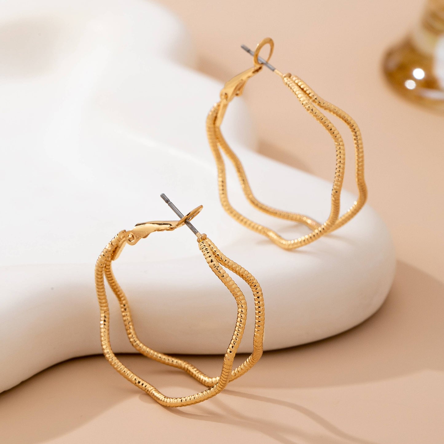 JOSSLYN by wall to wall - Textured Wavy Gold Hoop Earrings | 80E61896