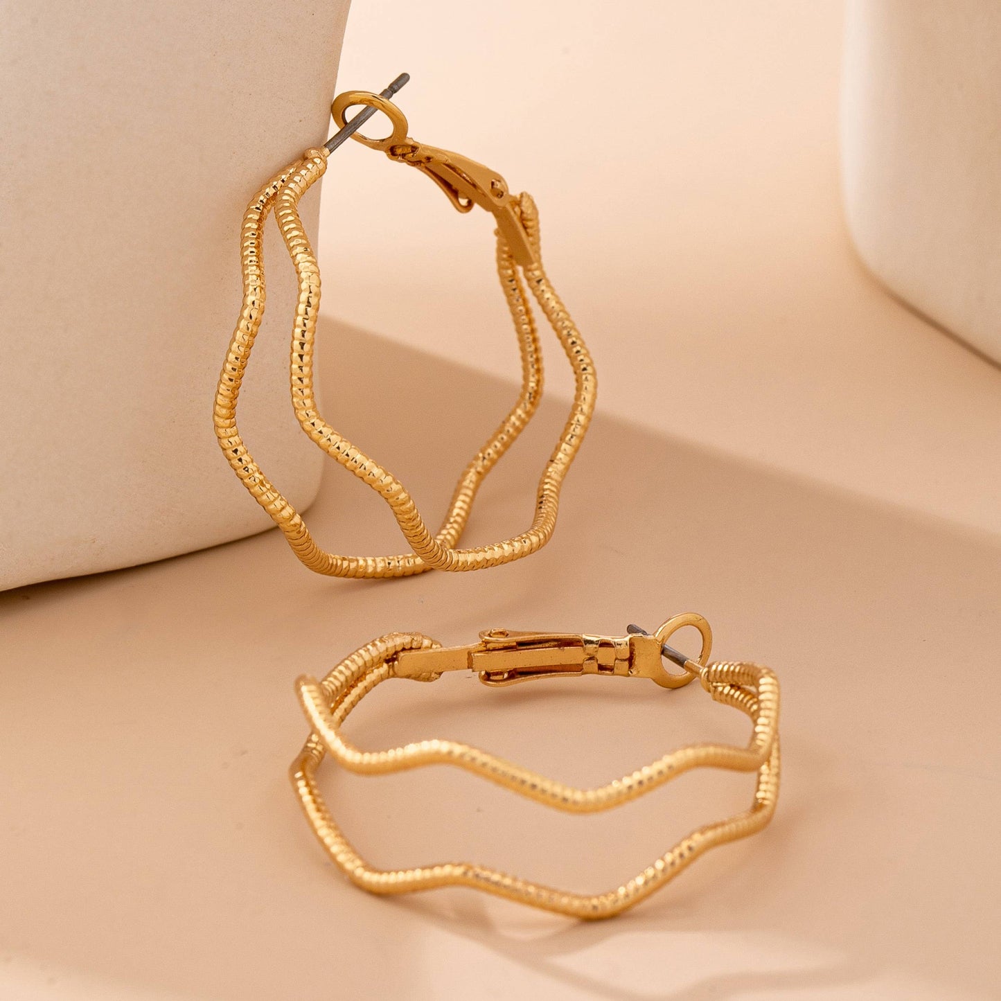 JOSSLYN by wall to wall - Textured Wavy Gold Hoop Earrings | 80E61896
