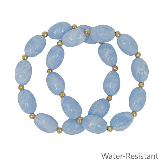 What's Hot - Set of 2 Light Blue Oval Acrylic and Gold Beaded Stretch Bracelets