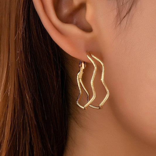 JOSSLYN by wall to wall - Textured Wavy Gold Hoop Earrings | 80E61896