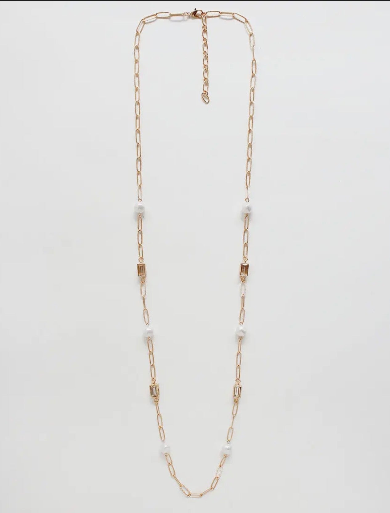 gold textured chain with clear crystal and pearl