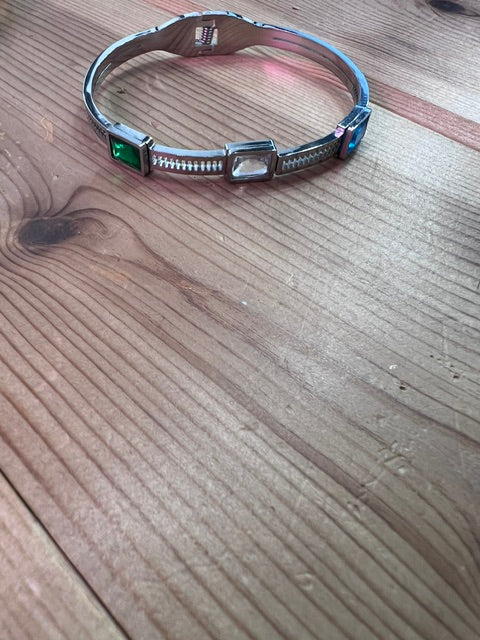 Silver bangle with color stones