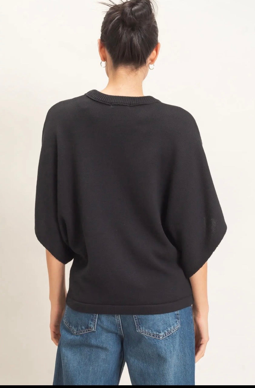 Black crewneck sweater