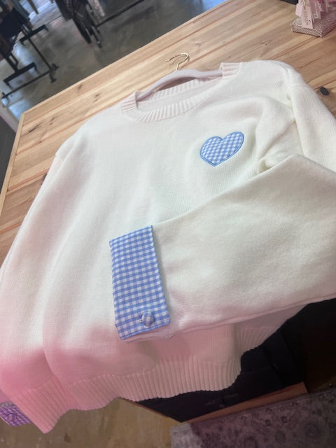 White sweater blue gingham