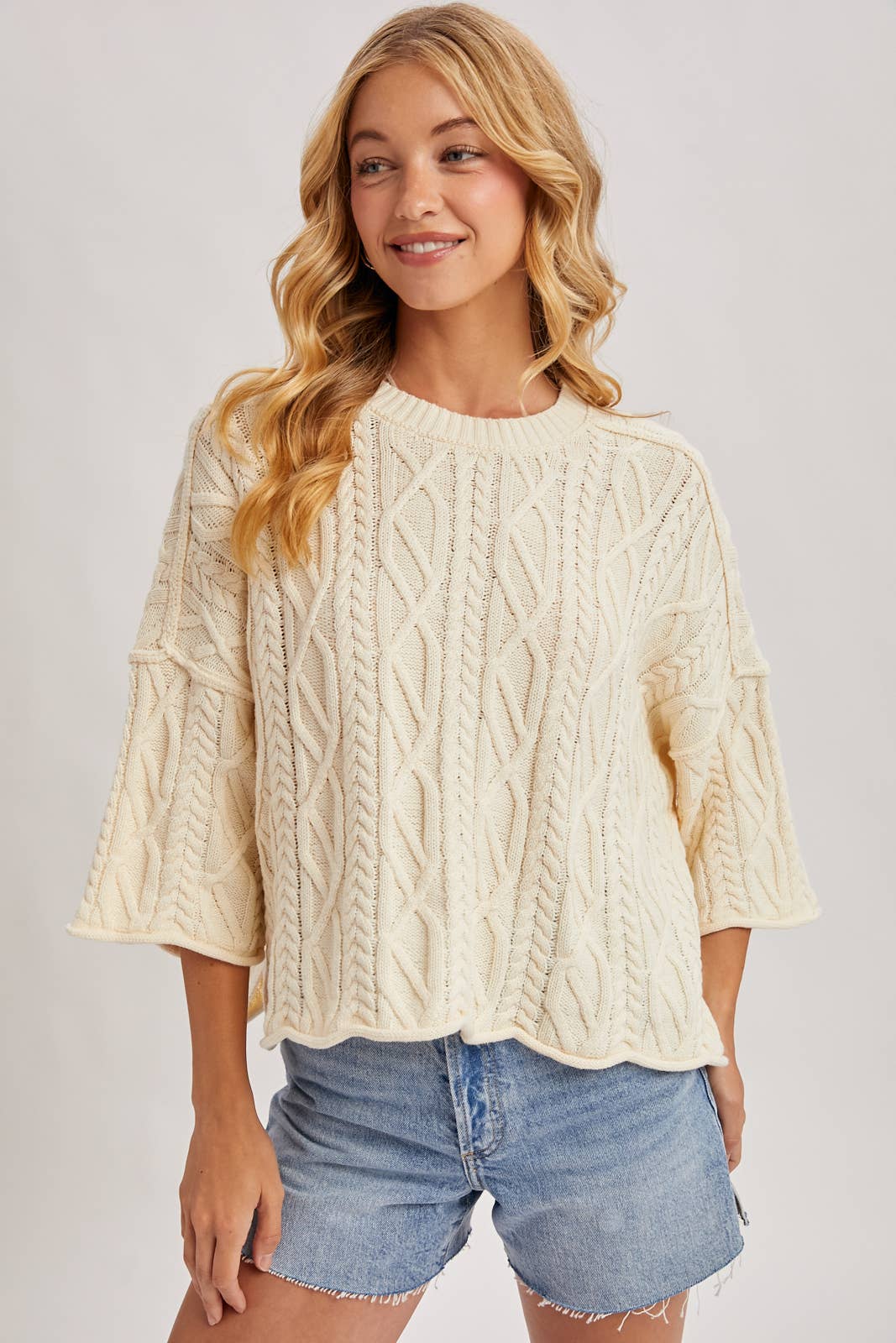 OVERSIZED BELL SLEEVE CABLE KNIT SWEATER
