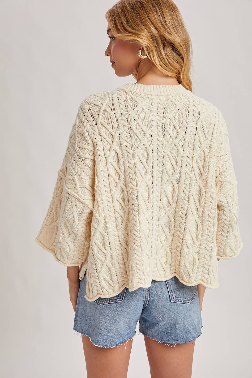 OVERSIZED BELL SLEEVE CABLE KNIT SWEATER